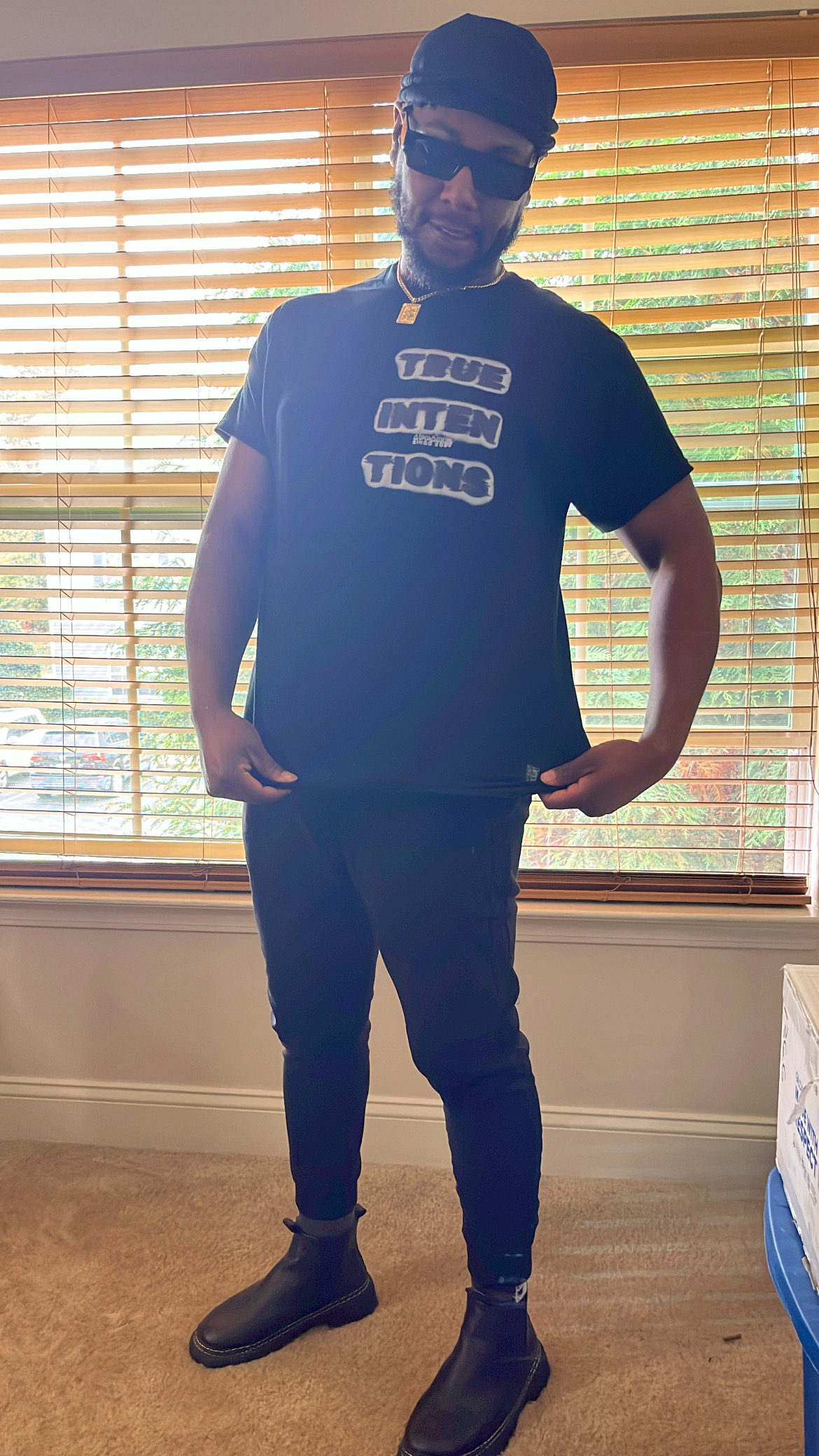 True Intentions creator wearing a black True Intentions shirt